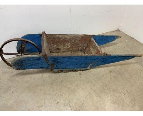 A Vintage wheelbarrow.