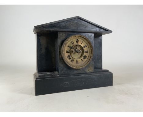 A slate eight day mantle clock. 