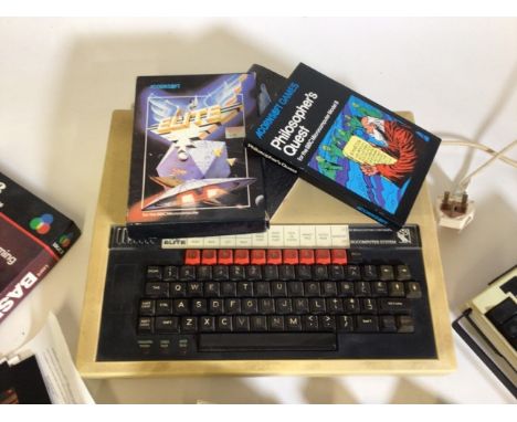 A BBC micro home computer 32k, Speed Synthesis and Cartridge ROM System with instruction manual, Logic3˜Learn basic programmi