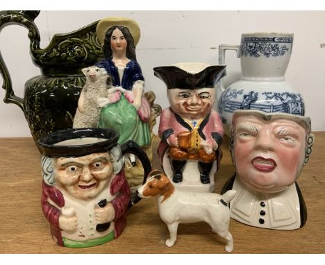 Toby jugs and other pottery also with a Beswick dog.