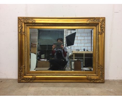 A large gilt framed mirror. W:122cm x D:cm x H:92cm
