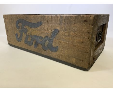 A vintage mechanics pine box with Ford lettering to both sides and metal handles