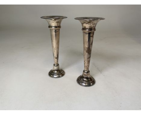 A pair of sterling silver trumpet vases with weighted bases by Charles S Green & Co Ltd, Birmingham. 1967.Gross weight: 9.3oz