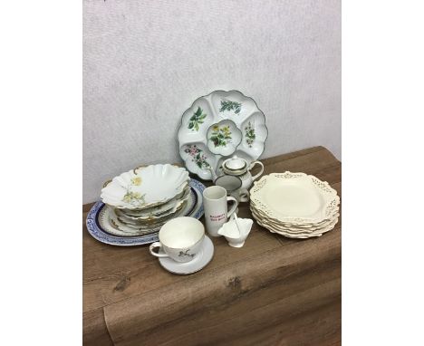 A Royal Worcester herb pattern hour-d'ouvres dish and other matching items. 
