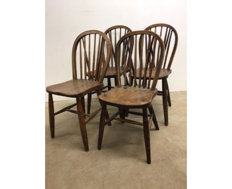 Four High Wycombe stick back oak and elm country dining chairs of various manufacturers.W:37cm x D:46cm x H:88cm