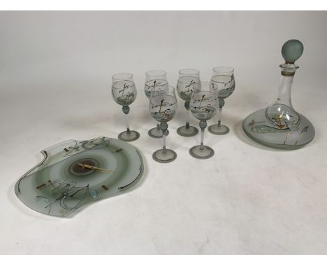 A set of six  Romanian wine glasses with a matching decanter and glass wall clock