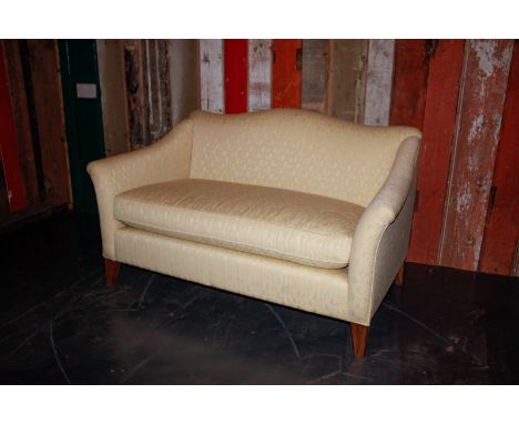 Two seater white sofa with oak legs