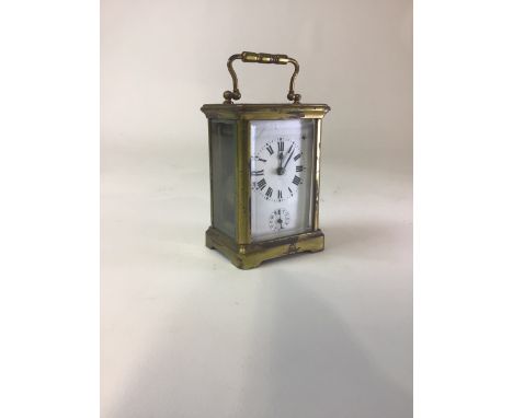 A French gilt brass carriage clock. Movement stamped made in France, H:11cm