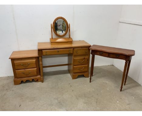 A modern pine desk by Singer furniture company Open Home also with a bedside chest and a mirror and an additional serpentine 
