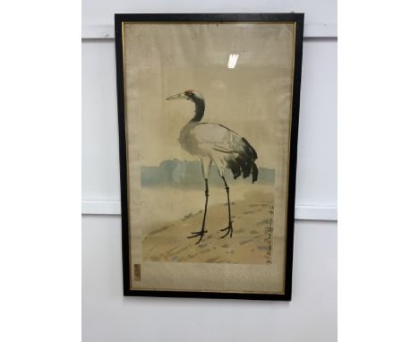 An oriental print of a crane with silk mount in black and gold frame. W:64cm x D:cm x H:102cm