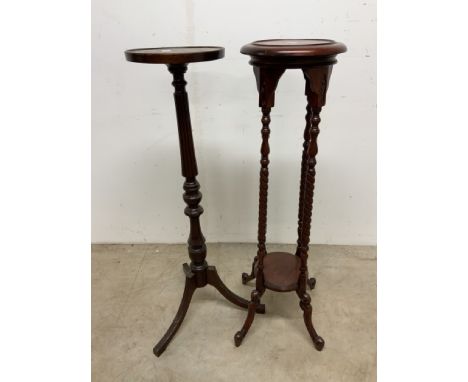 A mahogany jardiniere stand with twisted columns and a lower shelf together with one similar. W:28cm x D:28cm x H:103cm