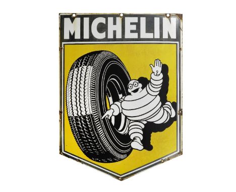 A Michelin enamel advertising sign,single-sided shield-shaped, 82 x 61cm, some chips, loss and rusting to mounting holes and 
