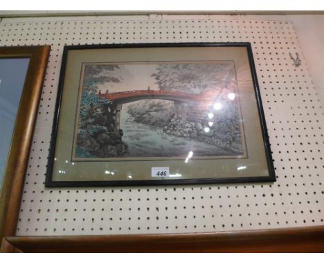 SOLD IN TIMED AUCTION A framed Japanese woodblock print of a bridge over a river 