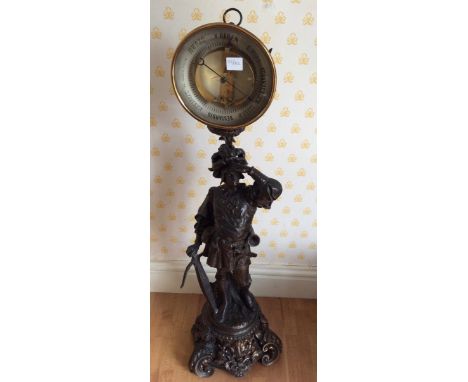Spelter figure of a bowman supporting a barometer.