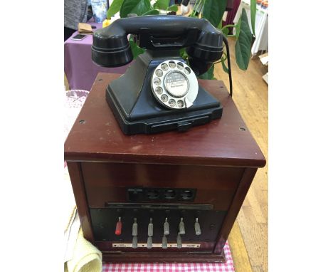 Vintage bakelite telephone and telephone exchange, by repute from KC.