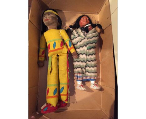 Two vintage red indian dolls