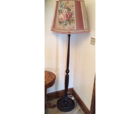 Mahogany standard lamp.