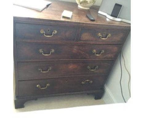A 19th c mahogany chest of drawers with bracket feet