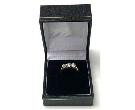 18ct gold and platinum 3 stone diamond ring, K (A).