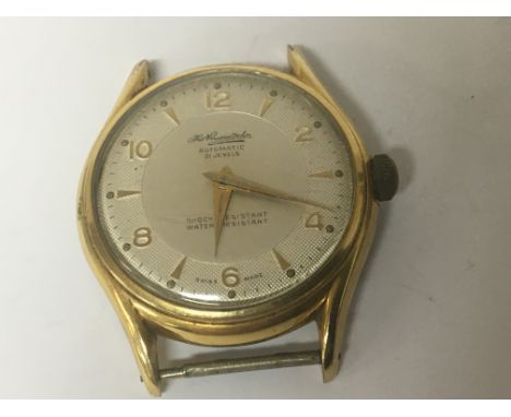 A Vintage Swiss made Gents watch seen working 21 Jewel Automatic.