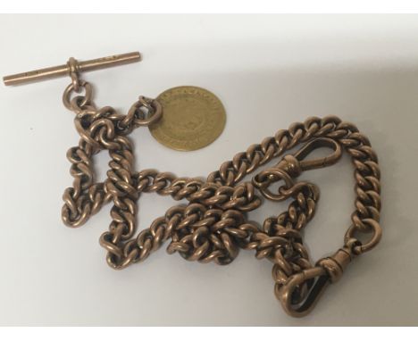 A Vintage 9carat gold watch chain with attached worn gold coin total weight 56g