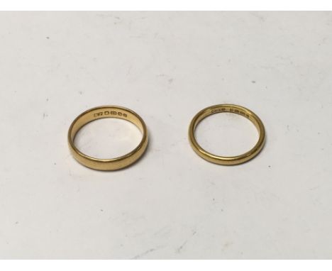 Two 22ct gold wedding rings, Approx weight 9 grams. Sizes P & R.