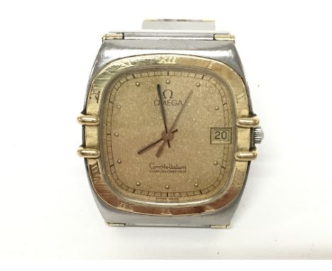 A vintage omega Constellation watch. Champagne dial. Quartz movement. Not seen working.