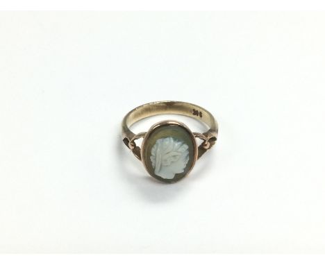 A 9ct vintage rose gold ring set with shell cameo and carved lady in profile, approx 2.9g an approx size M. Shipping category