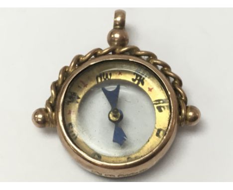 A 9ct gold compass fob, postage category A