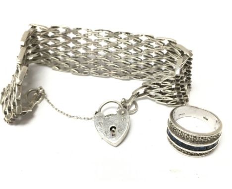 A silver ring (size N) and gate bracelet , postage category A