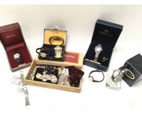 A Collection of costume jewellery including a silver necklace with ribbon pendant, various watches including Timex, Seiko, Se