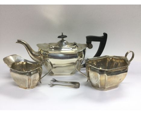 A silver three piece tea service, Sheffield hallmarks, total approx weight 1.1kg. Shipping category B.