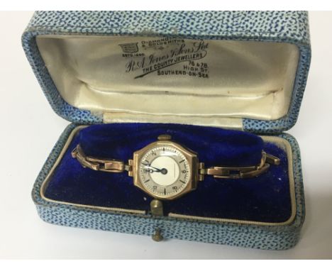 A Vintage ladies 9carat gold watch with an expandable spring loaded gold bracelet in a fit box weight 13g