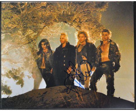 Kiefer Sutherland - The Lost Boys - autographed 8x10" colour photograph from the iconic 1980s movie. Signed in blue ink to a 