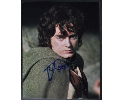 Elijah Wood - Lord Of The Rings - autographed 8x10" colour photograph from the franchise, signed by Wood in blue ink to the c