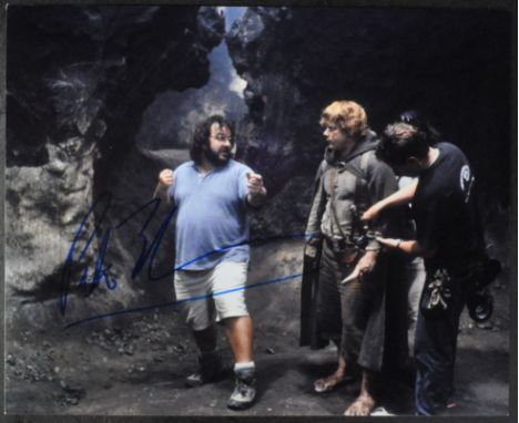 Peter Jackson - Lord Of The Rings (Director) - autographed 8x10" colour on-set photograph of Jackson directing a scene. Signe