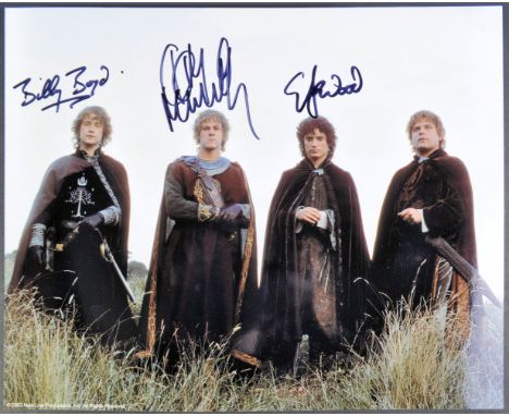 The Lord Of The Rings - a triple signed main cast 8x10" colour photograph, autographed by: Elijah Wood (Frodo), Billy Boyd (P