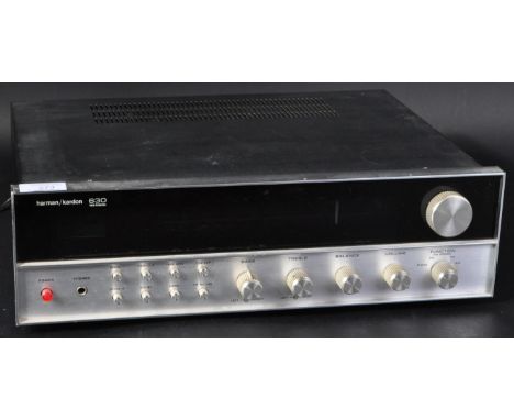 Harman / Kardon - Model 630 - Hi-Fi - A twin powered AM / FM stereo receiver having a polished steel front with faux black le