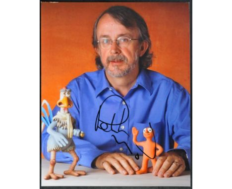 Aardman Animations - Peter Lord (Co-Founder) - Morph - autographed 8x10" colour photograph of Lord with Morph. Signed in blac