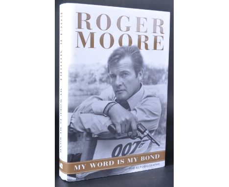 Sir Roger Moore (1927-2017) - James Bond 007 - ' My Word Is My Bond ' - signed first edition hardcover book, signed to the ti