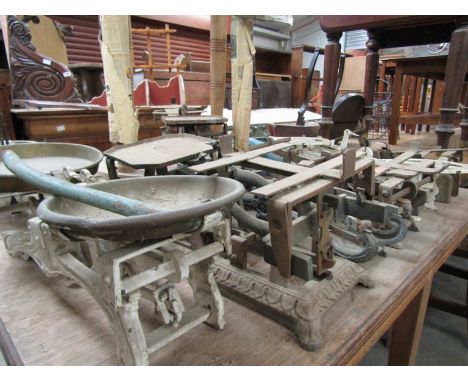 Ten assorted metal kitchen scale frames, some with trays 