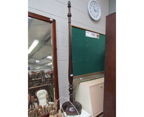A turned mahogany standard lamp and two carved lamp bases 