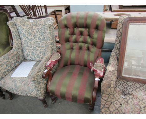 A Victorian mahogany framed button back armchair (arms a/f), brass castors 