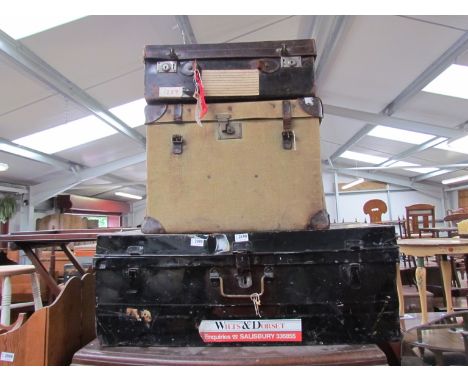 A tin trunk and two cases    