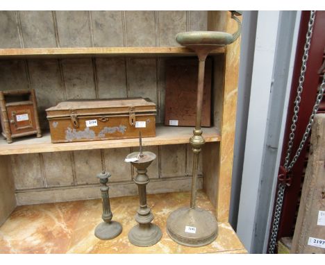 A brass smoking stand, cricket candle stand and a brass table lamp base (3) 