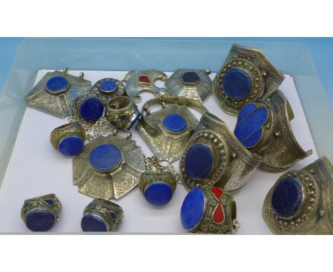 Afghan jewellery, four large bangles, one small bangle, seven pendants, chain and six rings