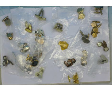 A collection of twenty-five pairs of vintage cufflinks