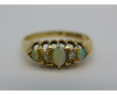 An 18ct gold, opal and diamond ring, 2.7g, P