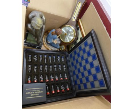 A Battle of Waterloo chess set and board, two resin figures, aneroid barometer, etc.