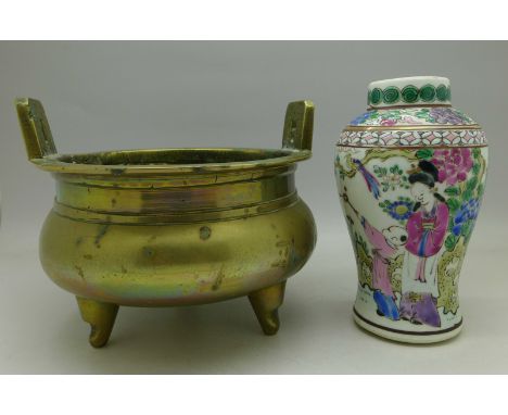 A brass three footed bowl, six character mark on base, diameter 14.5cm and a Chinese enamel decorated vase, 13cm